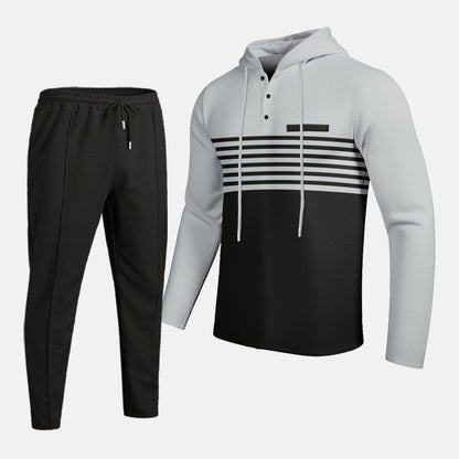 🔥Tvådelat set med huvtröja och byxor för herr, med snygg färgblockdesign och bekväm huvtröja👖
