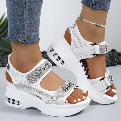 🔥Senaste erbjudande – 50 % rabatt – Trendiga ortopediska sandaler för damer med c-sulaompensée ornées de strass
