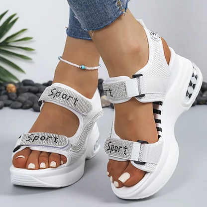 🔥Senaste erbjudande – 50 % rabatt – Trendiga ortopediska sandaler för damer med c-sulaompensée ornées de strass